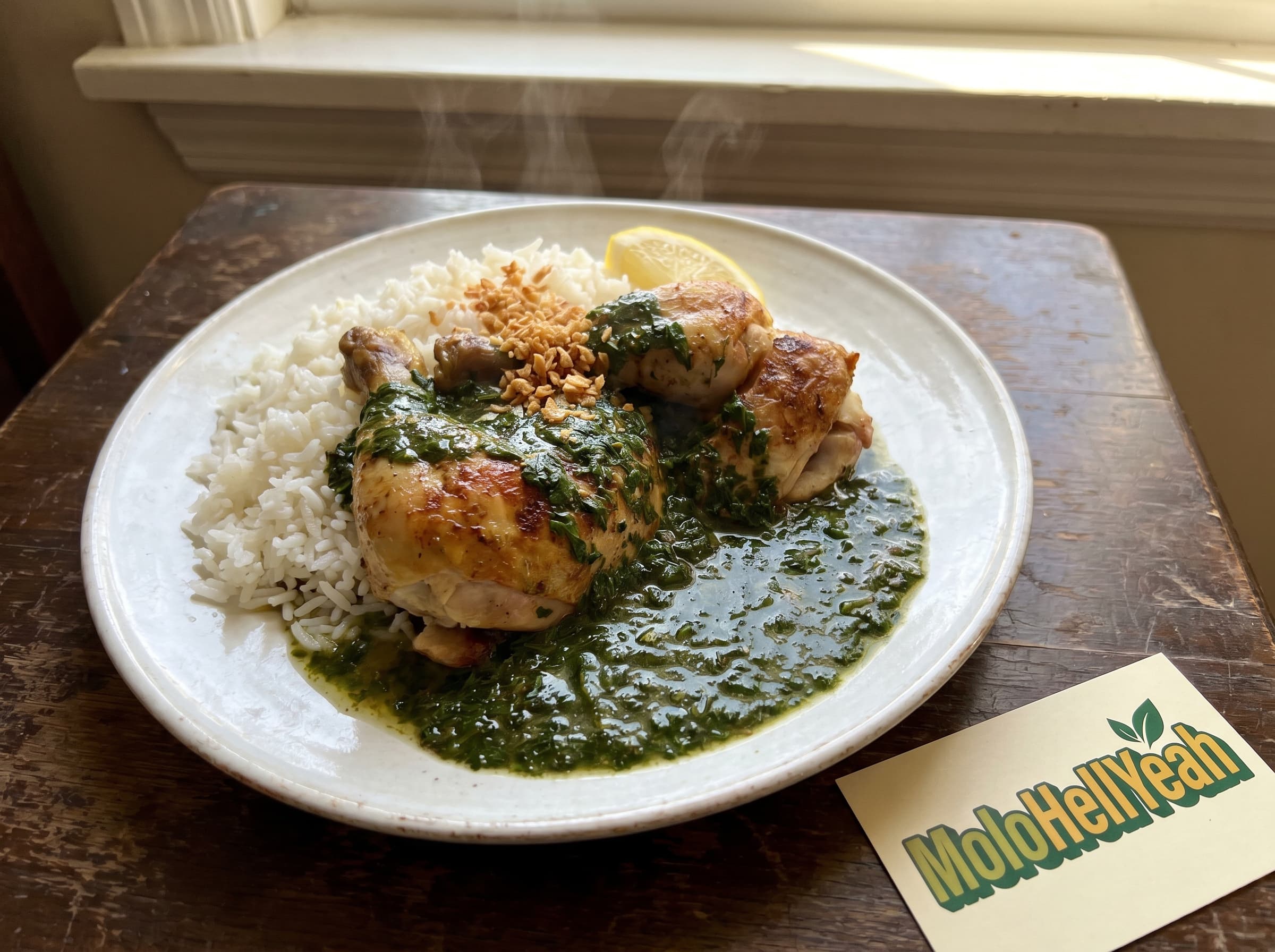 A bowl of Egyptian molokhia served with rice and golden chicken